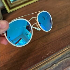 Gold frame / white ocular outline / blue lens raybans
